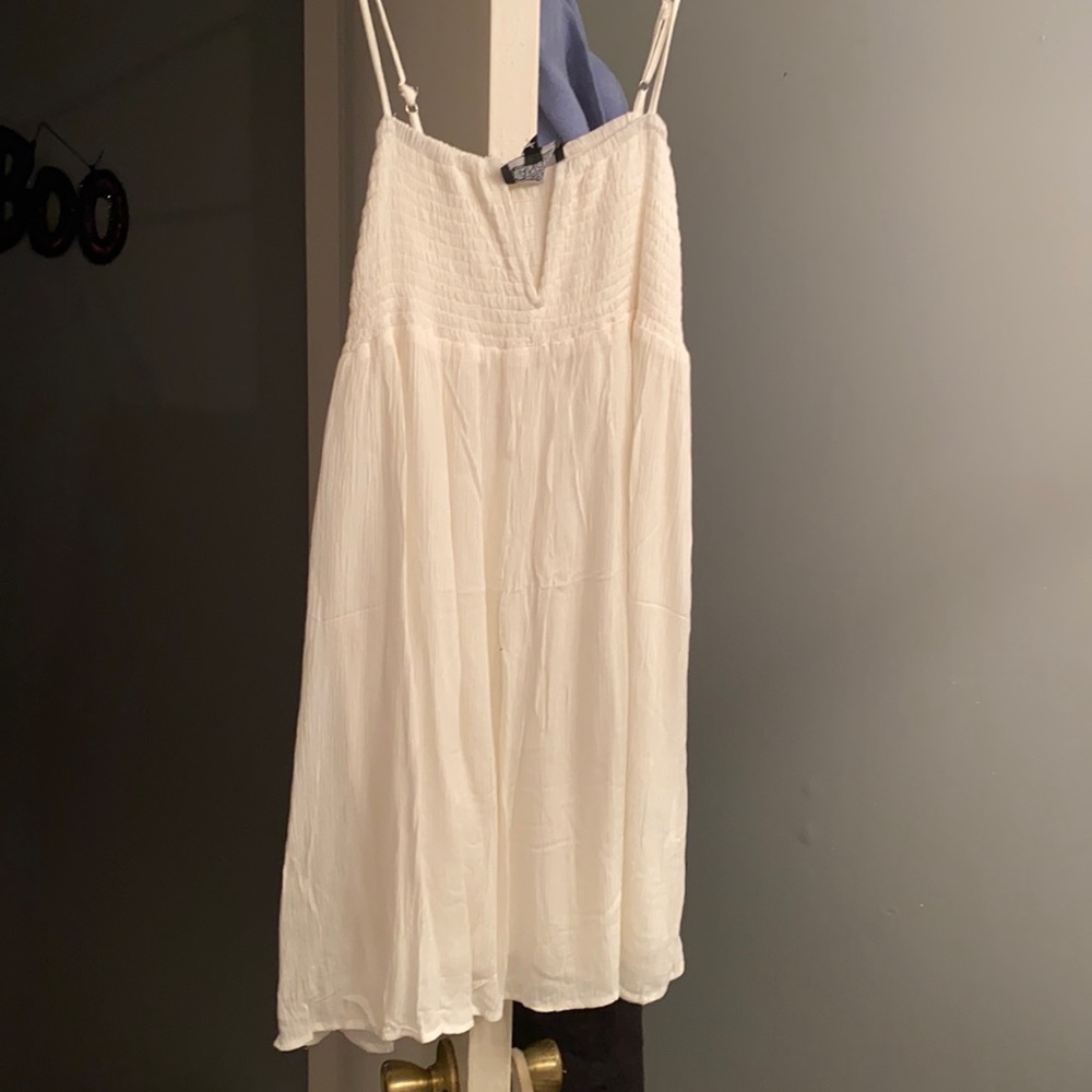 White dress, never worn before, still has the tags on it